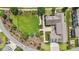 Aerial view of home and lush backyard; manicured landscaping creates a private oasis at 1342 Briar Chapel Pkwy, Chapel Hill, NC 27516