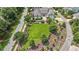 Scenic aerial view featuring a beautifully landscaped property with lush green lawns and inviting outdoor living areas at 1342 Briar Chapel Pkwy, Chapel Hill, NC 27516
