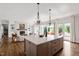 Open-concept kitchen and living room offering seamless flow and modern amenities at 1342 Briar Chapel Pkwy, Chapel Hill, NC 27516