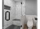 Bathroom with a glass-enclosed tile shower and new fixtures at 1383 Deercroft Ct, Graham, NC 27253