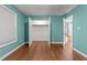Bedroom with hardwood floors and a closet for convenient storage at 1383 Deercroft Ct, Graham, NC 27253