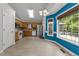 Bright kitchen featuring stainless appliances, and an eat-in area with large windows at 1383 Deercroft Ct, Graham, NC 27253