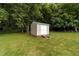 Storage shed in backyard, useful for additional storage at 1383 Deercroft Ct, Graham, NC 27253