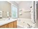 Relaxing bathroom with a large tub and plenty of natural light at 142 College Ave Ave, Durham, NC 27713