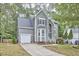 Attractive two-story home with a well-kept lawn, an attached garage, and a cozy curb appeal at 142 College Ave Ave, Durham, NC 27713