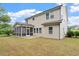 Spacious backyard featuring a screened-in porch and ample room for outdoor activities at 143 Thornbury St, Clayton, NC 27527