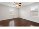 Bedroom featuring hardwood flooring and a large window with a view at 143 Thornbury St, Clayton, NC 27527