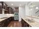 Modern kitchen features granite countertops, stainless steel appliances, and ample cabinet space at 143 Thornbury St, Clayton, NC 27527