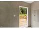 View of the back deck and backyard from the entryway at 150 Will Woods Way, Franklinton, NC 27525