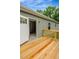 Inviting back deck, perfect for outdoor relaxation, with easy access to the home's interior at 150 Will Woods Way, Franklinton, NC 27525