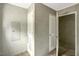 Hallway with linen closet and entry to the bathroom and bedroom at 150 Will Woods Way, Franklinton, NC 27525