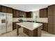 Well-equipped kitchen featuring an island, stainless steel appliances, and ample cabinet space at 150 Will Woods Way, Franklinton, NC 27525
