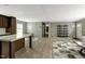 Spacious living room with light wood floors and modern gray walls at 150 Will Woods Way, Franklinton, NC 27525