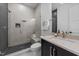 Modern bathroom with glass-enclosed shower, stylish vanity, and sleek fixtures at 15517 Possum Track Rd, Raleigh, NC 27614