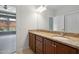 Bathroom features a double sink vanity with granite countertops at 1604 Vineyard Mist Dr, Cary, NC 27519