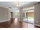 The open living room provides access to the backyard, which is accessible through sliding glass doors at 1604 Vineyard Mist Dr, Cary, NC 27519