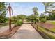 Community walkway leads to a common green space with a gazebo at 1604 Vineyard Mist Dr, Cary, NC 27519
