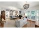 Cozy living room with fireplace, hardwood floors, and built in bookcases at 1700 St Marys St, Raleigh, NC 27608