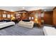 Inviting living room with wood paneling, comfortable seating, and unique decorations at 1700 St Marys St, Raleigh, NC 27608