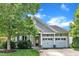 Charming home with a two-car garage and well-maintained landscaping at 1808 Pennypacker Ln, Durham, NC 27703