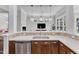 Kitchen sink with stainless steel appliances and open view to living room at 1808 Pennypacker Ln, Durham, NC 27703