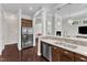 Stylish kitchen with stainless steel appliances, bright countertops, and an open layout at 1808 Pennypacker Ln, Durham, NC 27703