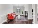 Bright living room featuring a fireplace, hardwood floors, and natural light, creating a cozy space at 1808 Pennypacker Ln, Durham, NC 27703