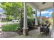 Cozy front porch with stone accents and comfortable seating at 1808 Pennypacker Ln, Durham, NC 27703
