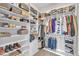 Walk-in closet with plenty of storage space for shoes, clothing, and personal items at 1808 Pennypacker Ln, Durham, NC 27703