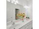 Bright bathroom features double sinks, large mirror, and modern lighting at 1817 Wysong Ct, Raleigh, NC 27612