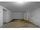 Spacious unfinished basement area with white walls and concrete floor at 1818 Cecil St, Durham, NC 27707