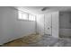 Basement features concrete floors, block walls, and a window for natural light at 1818 Cecil St, Durham, NC 27707