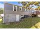 Home exterior with access to the basement and a view of the backyard at 1818 Cecil St, Durham, NC 27707