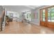 Bright dining area with stylish lighting, large windows, and easy access to the kitchen at 2100 Summit St, Durham, NC 27707