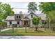 Beautiful home with charming landscaping and a manicured lawn at 2100 Summit St, Durham, NC 27707