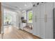 Spacious kitchen with built in storage, bench seat, stainless appliances and an open floor plan at 2100 Summit St, Durham, NC 27707