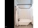 Clawfoot tub featuring curtain, faucet, and flooring at 212 W Church St, Benson, NC 27504