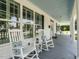 Relaxing porch featuring comfortable rocking chairs, offering a perfect spot to unwind at 212 W Church St, Benson, NC 27504
