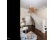 Elegant foyer featuring a staircase, dark wood floors and detailed moldings at 212 W Church St, Benson, NC 27504