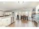 Bright eat-in kitchen features granite countertops, stainless steel appliances, and large windows for natural light at 216 Captain Harbor Hbr, Sanford, NC 27332