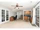 Large space with doors leading outside and a small bar area with a sink and storage at 216 Captain Harbor Hbr, Sanford, NC 27332