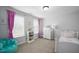 Cozy bedroom with bright accents, carpeted floors and natural light, creating a warm and inviting atmosphere at 226 Castle Pond Way, Fuquay Varina, NC 27526