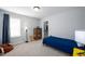 Comfortable bedroom with a blue color scheme, perfect for relaxation and rest at 226 Castle Pond Way, Fuquay Varina, NC 27526