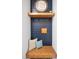 Stylish entryway with wooden bench, navy shiplap accent wall, shelf and hooks, perfect for organization at 226 Castle Pond Way, Fuquay Varina, NC 27526