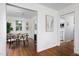 Bright dining area with hardwood floors features a modern round table and lots of natural light at 2523 Glendale Ave, Durham, NC 27704