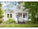 Charming single-story home with a covered front porch and landscaped front yard at 2523 Glendale Ave, Durham, NC 27704