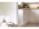 Kitchen view features a white cabinet and butcher block countertops at 2523 Glendale Ave, Durham, NC 27704