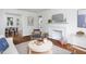 Beautiful living room with fireplace, stylish decor, open to the dining area at 2523 Glendale Ave, Durham, NC 27704