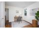 Office space with hardwood floors, a work desk and a decorative rug at 2523 Glendale Ave, Durham, NC 27704