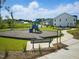 Well-maintained community playground with modern play equipment and benches at 267 Meadowbark Bnd # 34, Garner, NC 27529